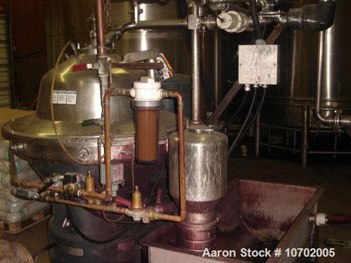 Used Westfalia SA-80-06-177 Desludger Disc Centrifuge. 316 stainless steel construction (product contact areas), clarifier design, centripetal pump liquid discharge, lube system, belt drive configura...