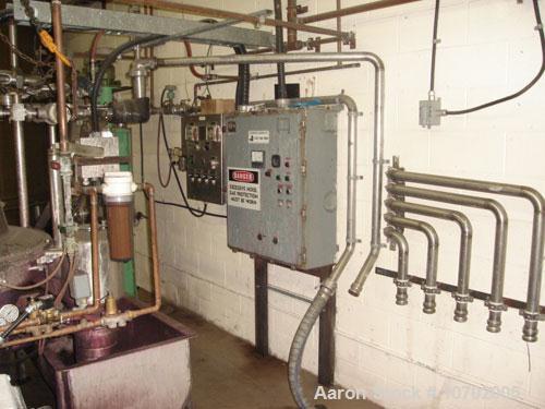 Used Westfalia SA-80-06-177 Desludger Disc Centrifuge. 316 stainless steel construction (product contact areas), clarifier design, centripetal pump liquid discharge, lube system, belt drive configura...