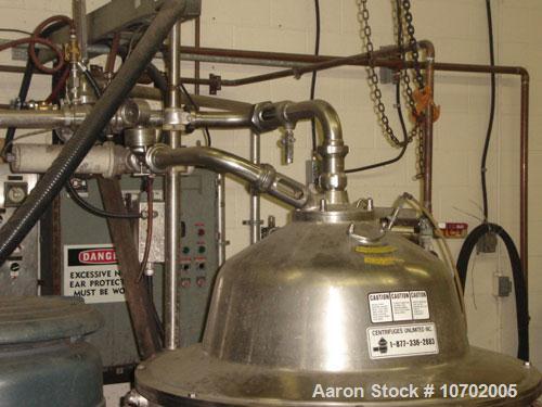 Used Westfalia SA-80-06-177 Desludger Disc Centrifuge. 316 stainless steel construction (product contact areas), clarifier design, centripetal pump liquid discharge, lube system, belt drive configura...