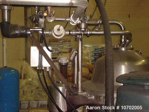 Used Westfalia SA-80-06-177 Desludger Disc Centrifuge. 316 stainless steel construction (product contact areas), clarifier design, centripetal pump liquid discharge, lube system, belt drive configura...
