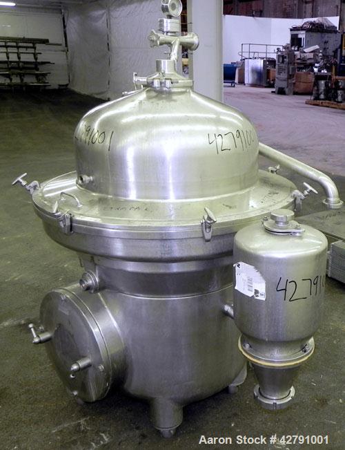 Used Westfalia SAMM 12006 Disc Centrifuge. 421 Stainless steel construction (product contact areas). Maximum bowl speed 4500 rpm, separator design, direct drive, 30 hp/22 kw drive motor (380/3/50). I...