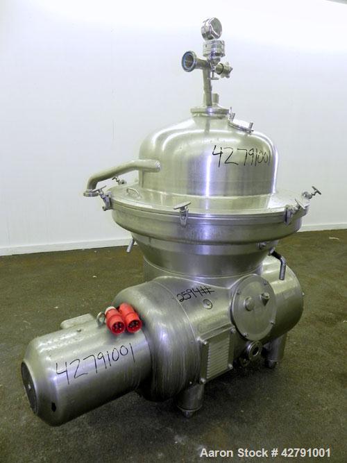 Used Westfalia SAMM 12006 Disc Centrifuge. 421 Stainless steel construction (product contact areas). Maximum bowl speed 4500 rpm, separator design, direct drive, 30 hp/22 kw drive motor (380/3/50). I...