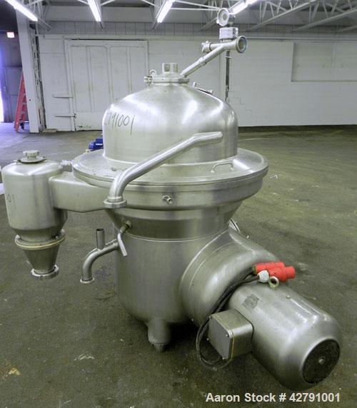 Used Westfalia SAMM 12006 Disc Centrifuge. 421 Stainless steel construction (product contact areas). Maximum bowl speed 4500 rpm, separator design, direct drive, 30 hp/22 kw drive motor (380/3/50). I...