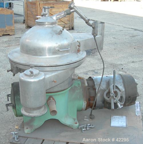 Used Westfalia Disc Centrifuge, Model SAMN-5036, 329 stainless steel. Maximum bowl speed 6500 rpm, centripetal pump liquid discharge. Direct driven by an approximately 20 hp motor.