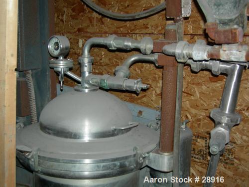 USED: Westfalia SAMR-3036 clarifier centrifuge, 10 hp motor 220/440/3/60/1770 rpm. Max bowl speed 7700 rpm, bowl volume 1.8 gal, sludgecap 1 gallon, rated @ 40 gpm. Spare parts, manual, jib crane &co...