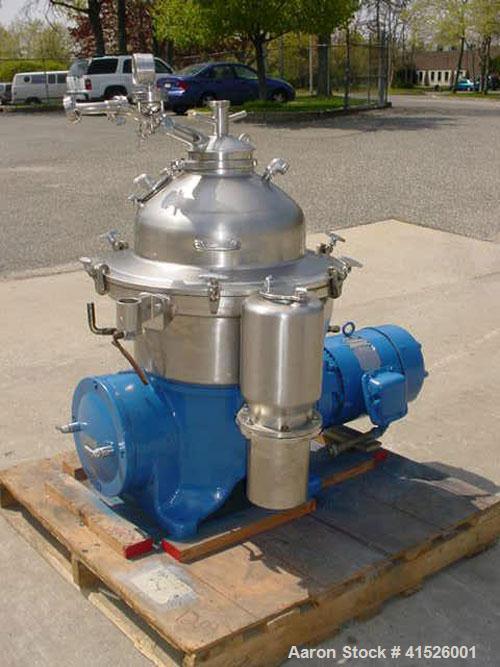 Used Westfalia SAMR-5036 Desludger Disc Centrifuge, stainless steel construction (product contact areas). Max bowl speed 6500 rpm, clarifier design, centripetal pump liquid discharge. Driven by a 20 ...