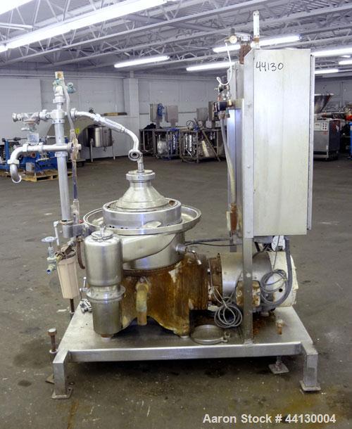 Used Westafalia SAMR 5036 Desludger Disc Centrifuge. 329 Stainless steel construction (product contact areas), maximum bowl speed 6500 rpm. Clarifier design (liquid/solids separation), centripetal pu...