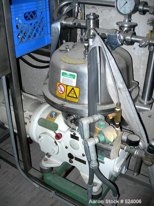 USED: Westfalia SB-7-03-076 desludger disc centrifuge. 316 stainless steel construction on product contact areas. Max bowl speed 9160 rpm, separator design, light phase gravity discharge, heavy phase...