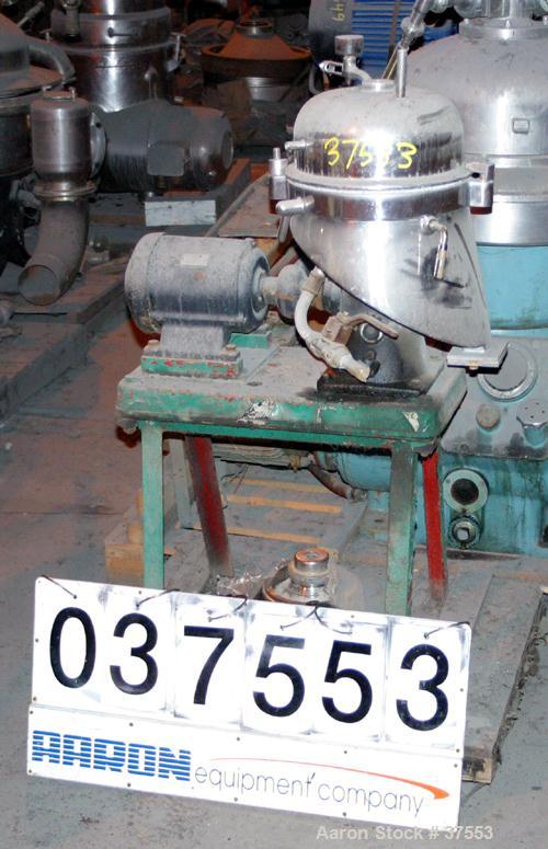 USED: Westfalia SA-1-06-175 pilot scale desludger. Sanitary clarifier design. Max bowl speed 10,000 rpm, max feed rate 3.5 gpm, liquid phase discharged under pressure. 1 kw fixed speed drive, 420/3/5...