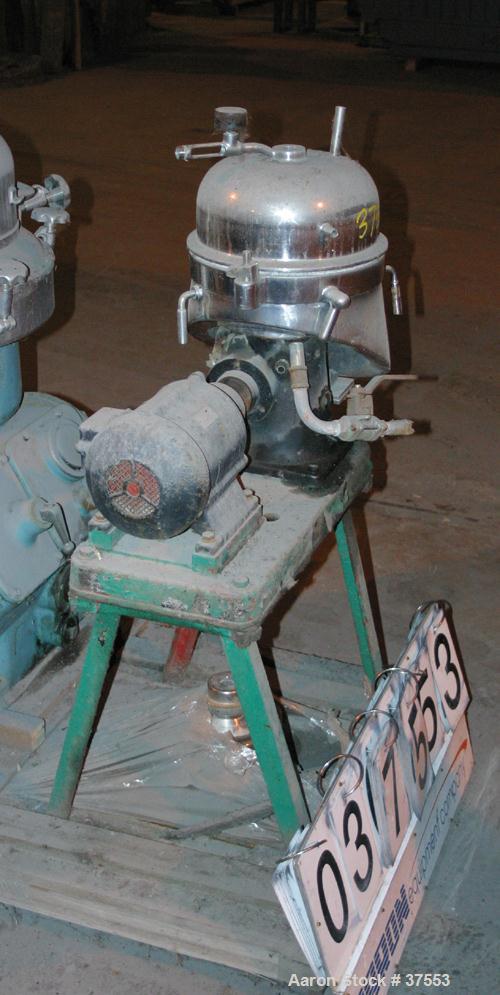 USED: Westfalia SA-1-06-175 pilot scale desludger. Sanitary clarifier design. Max bowl speed 10,000 rpm, max feed rate 3.5 gpm, liquid phase discharged under pressure. 1 kw fixed speed drive, 420/3/5...