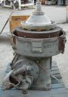 USED: Alfa-Laval AFPX-309-14B desludger centrifuge, 316 stainless steel, separator top feed. Driven by a 30 kw, 3/50 direct drive motor. Mounted on a carbon steel base.