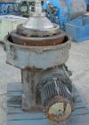 USED: Alfa-Laval AFPX-309-14B desludger centrifuge, 316 stainless steel, separator top feed. Driven by a 30 kw, 3/50 direct drive motor. Mounted on a carbon steel base.
