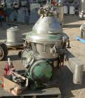 USED: Alfa-Laval brpx-309-34s desludger, two phase clarifier in stainless construction, flange mtd motor, 11 kw, 3/50/380, inlet & discharge piping.