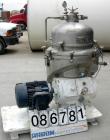 USED: Alfa Laval BRPX-213 desludger disc centrifuge. 316 stainless steel construction on product contact areas. Clarifier design, centripetal pump liquid discharge, direct drive configuration with mo...