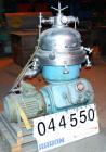 USED: Alfa Laval desludger disc centrifuge, model BRPX207-SGV-34.  316 stainless steel on product contact areas, clarifier design. Water harness, approx 7.5 hp motor (no tag), mounted on a sub-base.
