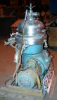 USED: Alfa Laval desludger disc centrifuge, model BRPX207-SGV-34.  316 stainless steel on product contact areas, clarifier design. Water harness, approx 7.5 hp motor (no tag), mounted on a sub-base.