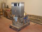 Used Alfa Laval WSPX-404-SGP-31G Desludger Disc Centrifuge. Stainless steel construction, clarifier design, centripetal pump liquid discharge, belt drive configuration, PLC control, mounted on cart.