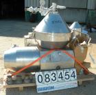 Used Alfa Laval MRPX-410-TGD-74 Desludger Disc Centrifuge. 329 Stainless Steel Construction on Product Contact Areas.Light and heavy phase centripetal pumps, timed solids discharge, stainless steel b...