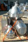 Used Alfa Laval MRPX-410-TGD-74 Desludger Disc Centrifuge. 329 Stainless Steel Construction on Product Contact Areas.Light and heavy phase centripetal pumps, timed solids discharge, stainless steel b...