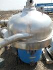 Used Westfalia SA-100 Desludger Disc Centrifuge. 316 Stainless steel construction (product contact areas). Separator design (liquid/liquid/solids separation). Centripetal pump and gravity overflow li...
