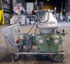 Used Westfalia SA-35-36-076 Desludger Disc Centrifuge. 316 stainless steel (product contact areas), 6550 rpm maximum bowl speed, clarifier design (liquid/solids separation), centripetal pump liquid d...
