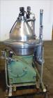 Used Westfalia SA-35-36-076 Desludger Disc Centrifuge. 316 stainless steel (product contact areas), 6550 rpm maximum bowl speed, clarifier design (liquid/solids separation), centripetal pump liquid d...