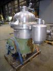 Used Westfalia SA-45-03-076 Disc Centrifuge. 316 Stainless steel construction (product contact areas). Maximum bowl speed 5000 rpm, separator design (Liquid/liquid/solids separation), heavy phase cen...