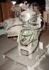 Used Westfalia SA7-06-076 Desludger Disc Centrifuge, 316 Stainless Steel Construction (Product Contact Areas). Maximum bowl speed 8400 rpm, clarifier design, centripetal pump liquid discharge. Driven...