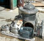 USED: Westfalia SAM-3036 Desludger Disc Centrifuge. 316 stainless steel construction on product contact areas, clarifier design. Max bowl speed 6500 rpm. Direct driven by a 7.5 kw (10 hp), 3/50/380 v...