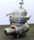 Used Westfalia SAMM 12006 Disc Centrifuge. 421 Stainless steel construction (product contact areas). Maximum bowl speed 4500 rpm, separator design, direct drive, 30 hp/22 kw drive motor (380/3/50). I...