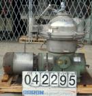 Used Westfalia Disc Centrifuge, Model SAMN-5036, 329 stainless steel. Maximum bowl speed 6500 rpm, centripetal pump liquid discharge. Direct driven by an approximately 20 hp motor.
