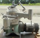 Used Westfalia Disc Centrifuge, Model SAMN-5036, 329 stainless steel. Maximum bowl speed 6500 rpm, centripetal pump liquid discharge. Direct driven by an approximately 20 hp motor.