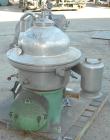 Used Westfalia Disc Centrifuge, Model SAMN-5036, 329 stainless steel. Maximum bowl speed 6500 rpm, centripetal pump liquid discharge. Direct driven by an approximately 20 hp motor.