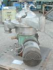 Used Westfalia Disc Centrifuge, Model SAMN-5036, 329 stainless steel. Maximum bowl speed 6500 rpm, centripetal pump liquid discharge. Direct driven by an approximately 20 hp motor.