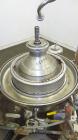 Used Westafalia SAMR 5036 Desludger Disc Centrifuge. 329 Stainless steel construction (product contact areas), maximum bowl speed 6500 rpm. Clarifier design (liquid/solids separation), centripetal pu...
