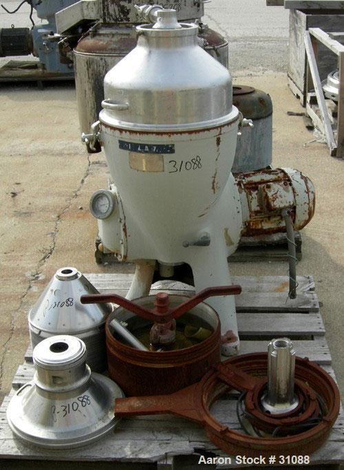 Used Alfa-Laval CDM 209-74S-60 Oil Purifier, 430 Stainless Steel. Designed for applications with mostly heavy phase, rated at 15 gallons per minute. 7.5 hp motor 480/3/60. Pump on heavy phase dischar...