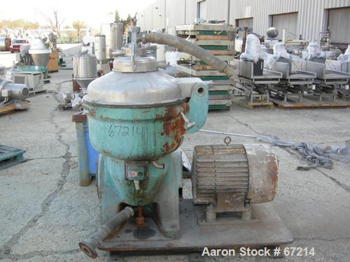 USED: Alfa Laval TVB-214H-15-21-60 solid bowl disc centrifuge. 316 stainless steel construction, separator design, coupled drive, sub-base, 15 hp drive motor 440/3/60/1790 rpm.