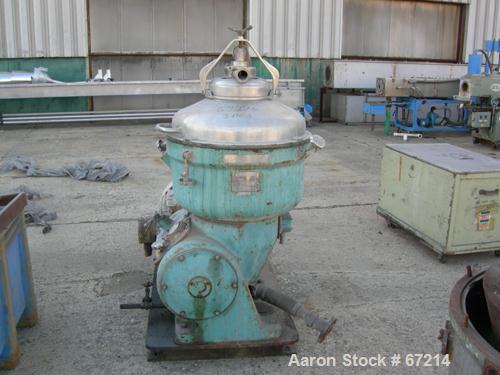 USED: Alfa Laval TVB-214H-15-21-60 solid bowl disc centrifuge. 316 stainless steel construction, separator design, coupled drive, sub-base, 15 hp drive motor 440/3/60/1790 rpm.