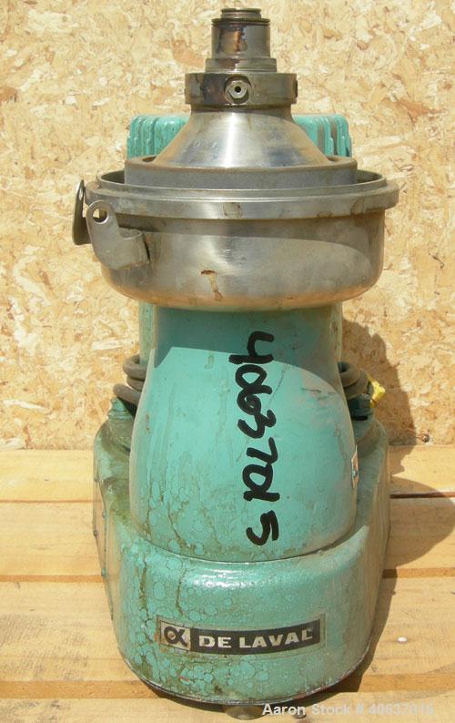 Used Delaval Gyro Tester Lab Disc Centrifuge, 316 stainless steel. Separator bowl design. Driven by a 1/3 hp, 1/60/115 volt, 3450 rpm XP motor. Base mounted. Missing top cover and feed pipe.   