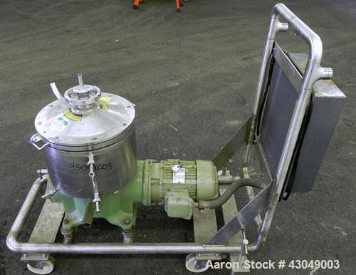 Used Westfalia BKA-6-86-076 Solid Bowl Disc Centrifuge, 316 Stainless Steel. Maximum bowl speed 8510 rpm, direct drive configuration, 7.5 hp drive motor. Mounted on a cart with casters and a control ...