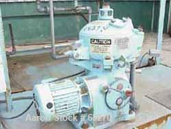 USED:Westfalia OTB2-00-066 solid bowl disc centrifuge. Stainless steel/aluminum construction. Max bowl speed 9380 rpm, separator  design, direct drive, 1 hp drive motor, 3/60/220/440, feed tank. Unit...