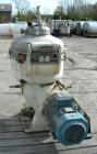 Used Alfa-Laval Model TGV-214H Solid Bowl Disc Centrifuge. 329 Stainless steel construction (product contact areas). Separator design, bottom feed, centripetal pump liquid discharge. Direct drive con...