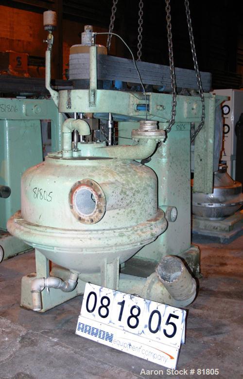 USED: Dorr Oliver Merco B-30 Nozzle Disc Centrifuge. 317 stainless steel rotor assembly, max bowl speed 2550 rpm, bronze housing, base with hoist, 125 hp, 460/3/60 drive motor, electric spindle oiler...
