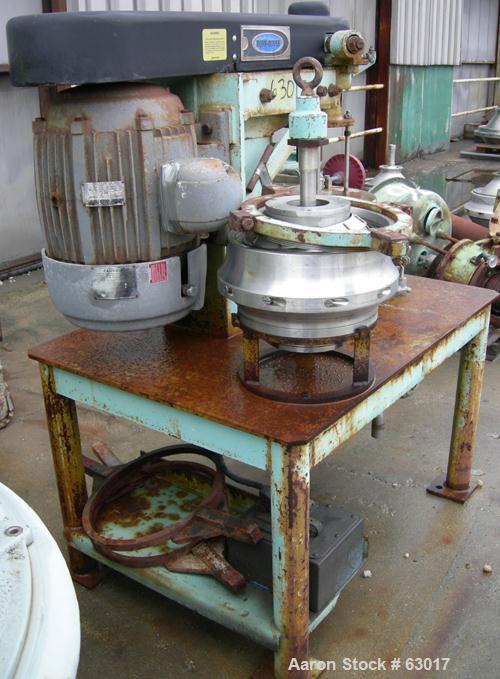 Used Dorr Oliver CSU-14 Nozzle Disc Centrifuge. 316 Stainless steel construction, maximum bowl speed 6100 rpm, skimmer assembly. Driven by a 25 hp, 3/50/400 volt, 2955 rpm motor. Unitized on a carbon...