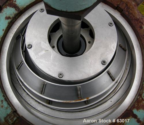 Used Dorr Oliver CSU-14 Nozzle Disc Centrifuge. 316 Stainless steel construction, maximum bowl speed 6100 rpm, skimmer assembly. Driven by a 25 hp, 3/50/400 volt, 2955 rpm motor. Unitized on a carbon...