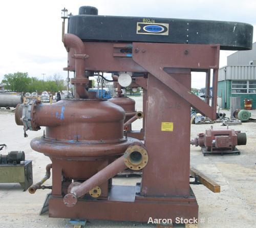 USED: Dorr Oliver Merco BH-36 nozzle disc centrifuge. Ferralium 225 rotor assembly, bronze housing. Driven by a 150 hp, 3/60/460 volt, 1760 rpm motor, 2600 rpm bowl speed. Includes control panel, bas...