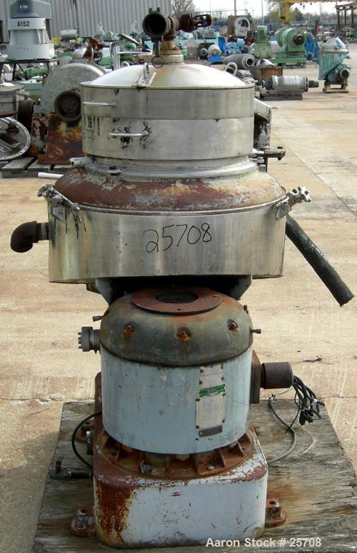 USED: Sharples DH-3 Nozzljector disc centrifuge, 304 stainless steel, separator design. Max bowl speed 6350 rpm. Max operating temperature 212 deg, belt drive configuration. Driven by an approximate ...
