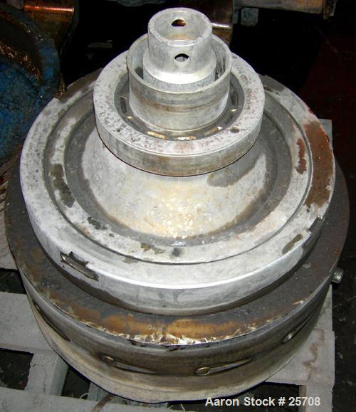USED: Sharples DH-3 Nozzljector disc centrifuge, 304 stainless steel, separator design. Max bowl speed 6350 rpm. Max operating temperature 212 deg, belt drive configuration. Driven by an approximate ...