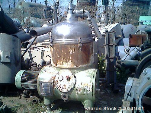 Used Westfalia nozzle centrifuge, type RTA140-51-076. Material of construction is 316 stainless steel. Max bowl speed 5000 rpm by an approximate 27.75 hp/18.5 kw-380 volt/50 cycle/3 ph XP flanged dri...