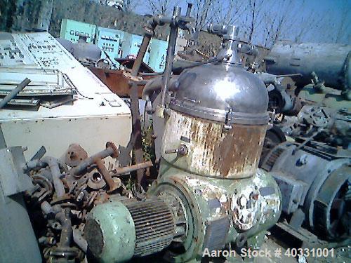 Used Westfalia nozzle centrifuge, type RTA140-51-076. Material of construction is 316 stainless steel. Max bowl speed 5000 rpm by an approximate 27.75 hp/18.5 kw-380 volt/50 cycle/3 ph XP flanged dri...